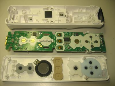 [ wii open with pc board printed circuit side ]